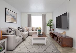 Amarillo apartment for rent - a living room with a couch and a coffee table and a television