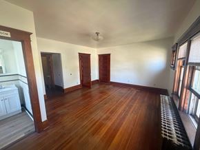 Fremont apartment for rent - A room with wooden floors and a white ceiling.