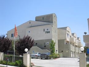 Riverside apartment for rent - A building with the number 750 on it.