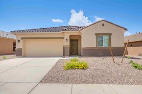 Tucson house for rent - a new house with a driveway and a garage door