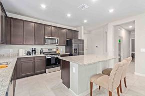 Tucson house for rent - a kitchen with a counter top and a sink
