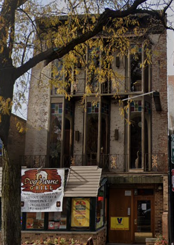 Chicago apartment for rent - an old building with a sign in front of it