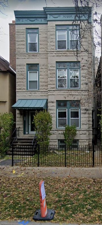 Chicago apartment for rent - an old house with a cone in front of it