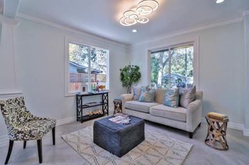 San Jose house for rent - a living room with a couch and a chair