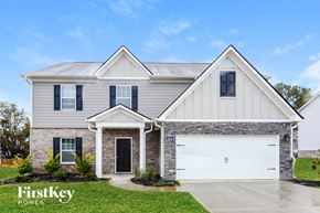 Cartersville house for rent - a home with a white house and a white garage door