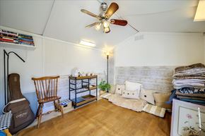San Jose house for rent - a living room with a couch and a ceiling fan