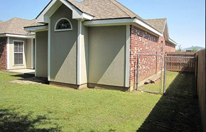 Youngsville house for rent - a house with a yard and a fence