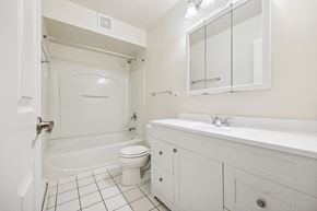 Lombard apartment for rent - a bathroom with a sink toilet and a shower