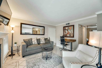 Irving house for rent - a living room with a couch and a chair