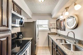 Irving house for rent - full kitchen with stainless steel appliances and granite counter tops