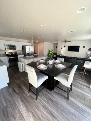 San Antonio house for rent - an open kitchen and dining room with a table and chairs