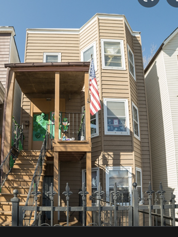 Chicago apartment for rent - a house with an flag on the front of it