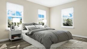 Sayreville apartment for rent - a bedroom with a bed and three windows