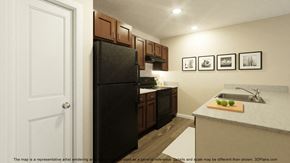 Sayreville apartment for rent - a kitchen with a black refrigerator and a sink