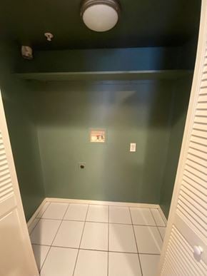 Tulsa apartment for rent - a bathroom with green walls and a white tile floor