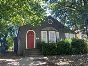 Tulsa house for rent - the front of a house with a red door