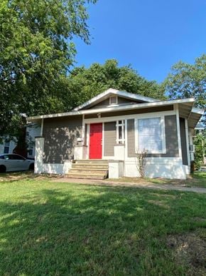 Tulsa house for rent - a small gray house with a red door