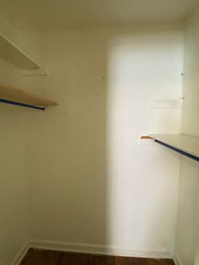Tulsa house for rent - an empty room with shelves on the wall