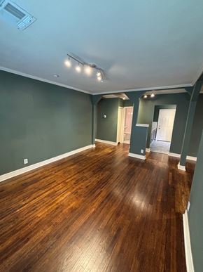 Tulsa house for rent - A room with wooden flooring and a white ceiling.