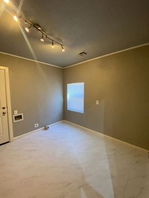Tulsa house for rent - A room with a door and a window.