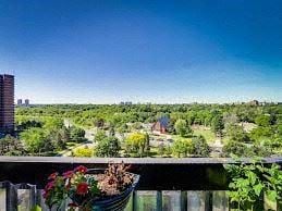 Etobicoke apartment for rent - a balcony with a basket of flowers on it
