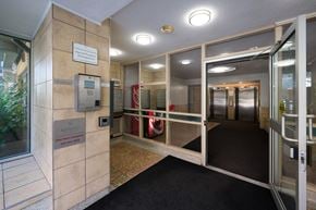 Toronto apartment for rent - The image shows a hallway with a sign that reads "Myriad".