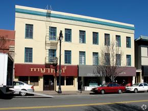 San Rafael apartment for rent - A building with a red awning that says "myth" on it.