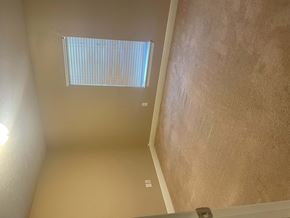 Leesville house for rent - an empty room with a window on the wall