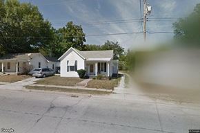Clinton apartment for rent - a small white house on the corner of a street