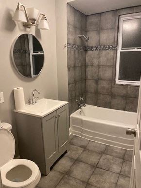 Chicago apartment for rent - a bathroom with a sink toilet and a bath tub