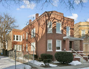 Chicago apartment for rent - a red brick house with snow in front of it