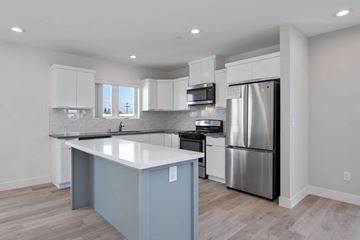 Los Angeles apartment for rent - a renovated kitchen with white cabinets and stainless steel appliances