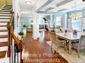 Blythewood house for rent - a large dining room and living room with a table and chairs