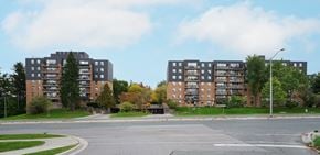 Scarborough apartment for rent - Two apartment buildings are situated next to each other.