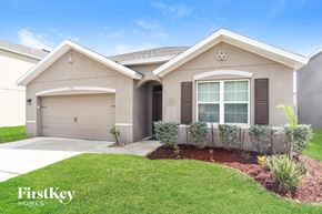 Rockledge house for rent - A house with a garage and a window is shown.