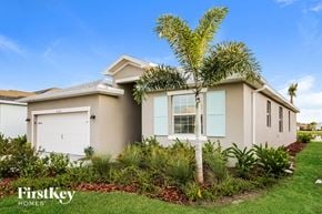Babcock Ranch house for rent - a house with a palm tree in front of it
