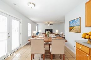 Charlotte house for rent - A dining room with a table set for four.