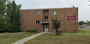 Hawley apartment for rent - a brick building with a sidewalk in front of it