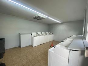El Campo apartment for rent - an empty laundry room with washers and machines