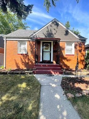 Hammond house for rent - a red brick house with a white door and a sidewalk