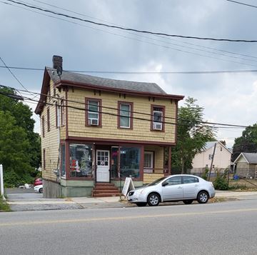 Peekskill apartment for rent - a house with a car parked in front of it