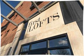Rochester apartment for rent - A building with a sign that says "First Lofts".
