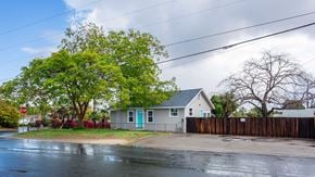 Lemon Grove house for rent - A house with a blue door is surrounded by a wooden fence.