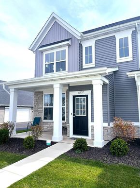 Crown Point house for rent - A house with a front porch and a black door.