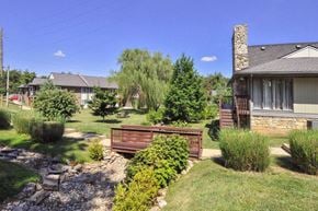 Louisville apartment for rent - A residential area with houses and a bridge.