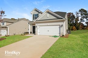 Greer house for rent - A house with a garage is shown in the image.
