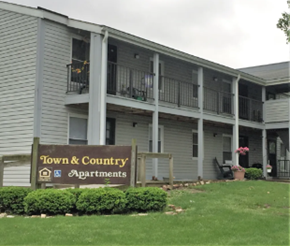 Highland apartment for rent - a building with a sign for town  country apartments
