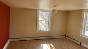Pictou apartment for rent - an empty room with a large window and a lamp