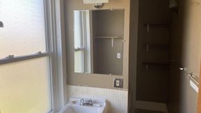Pictou apartment for rent - a bathroom with a sink and a mirror