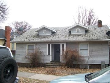Pullman apartment for rent - a white house with two dormers on top of it